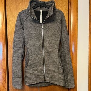 Gray zip up jacket with pockets and thumb holes